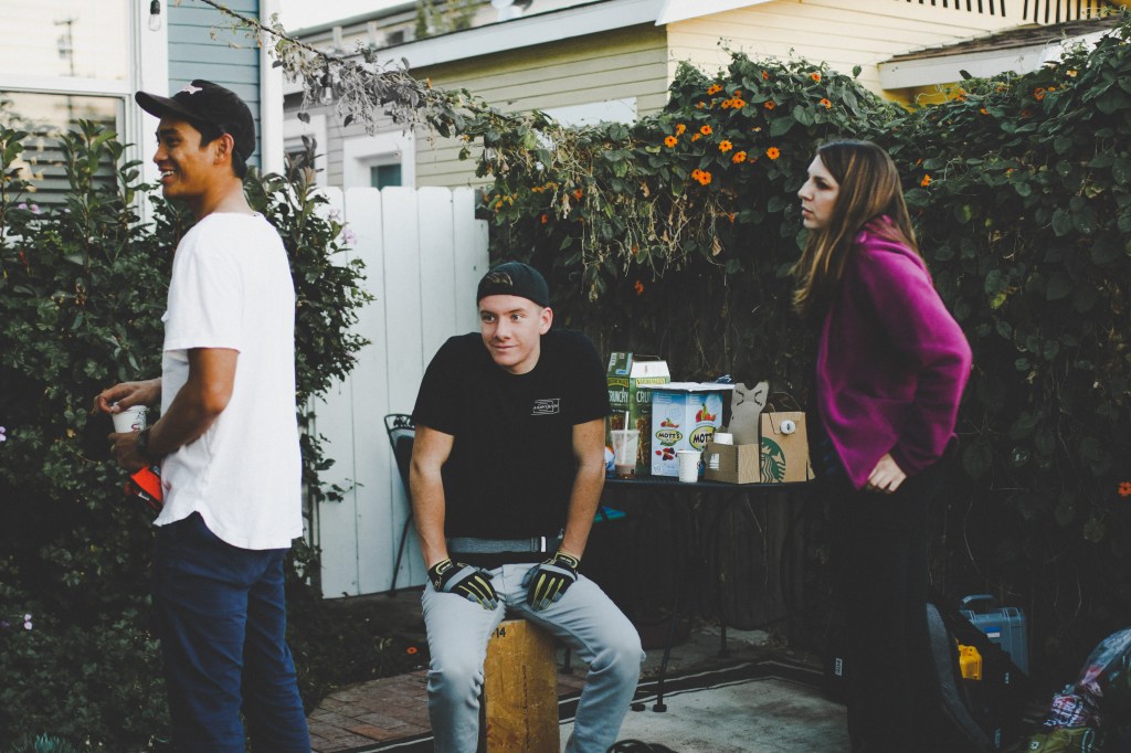 Kyle DeGuzman, Anthony Grimm, and Erin Martinez hanging out on set