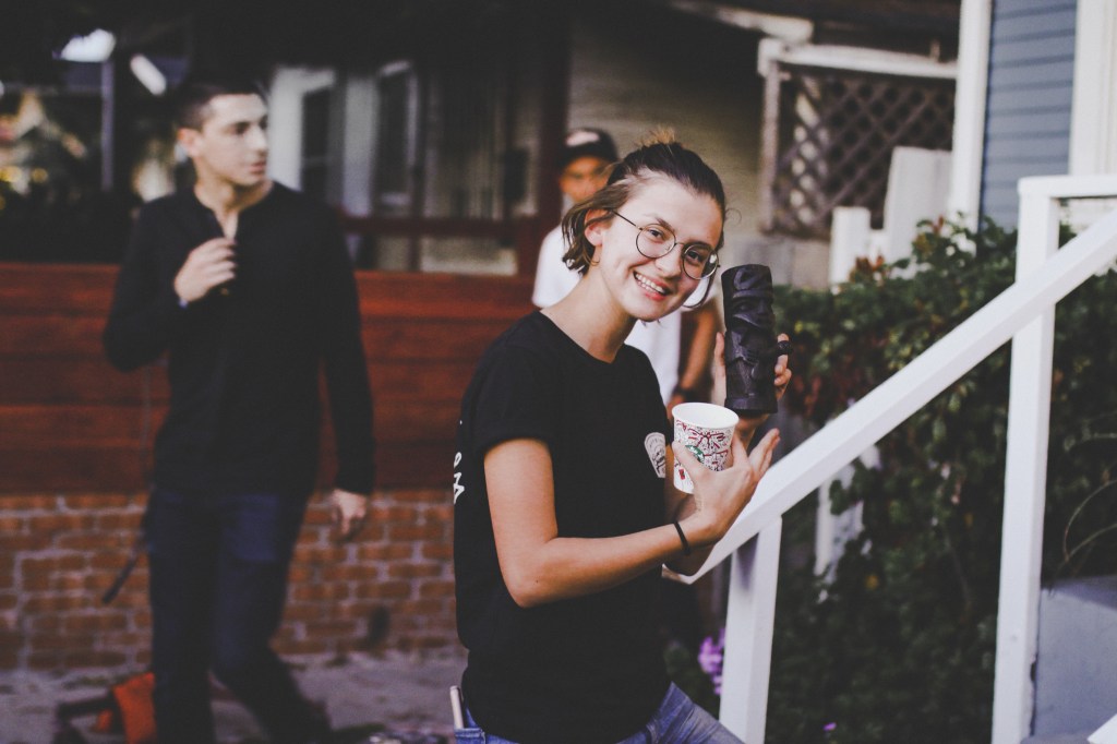 Jenna Castillo holding a prop