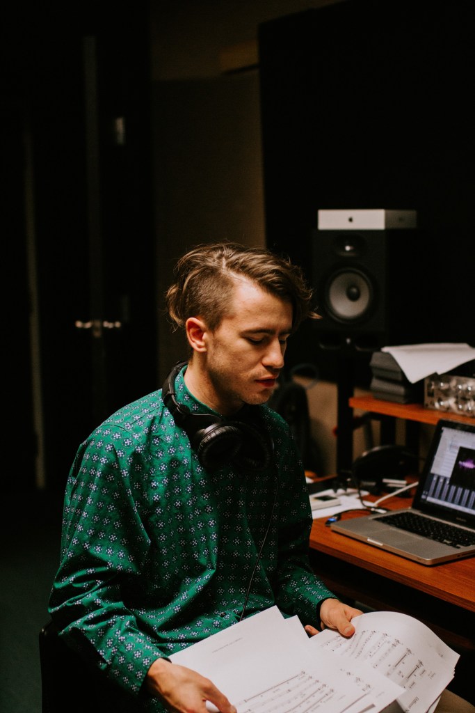 James Bishop talking through sheet music