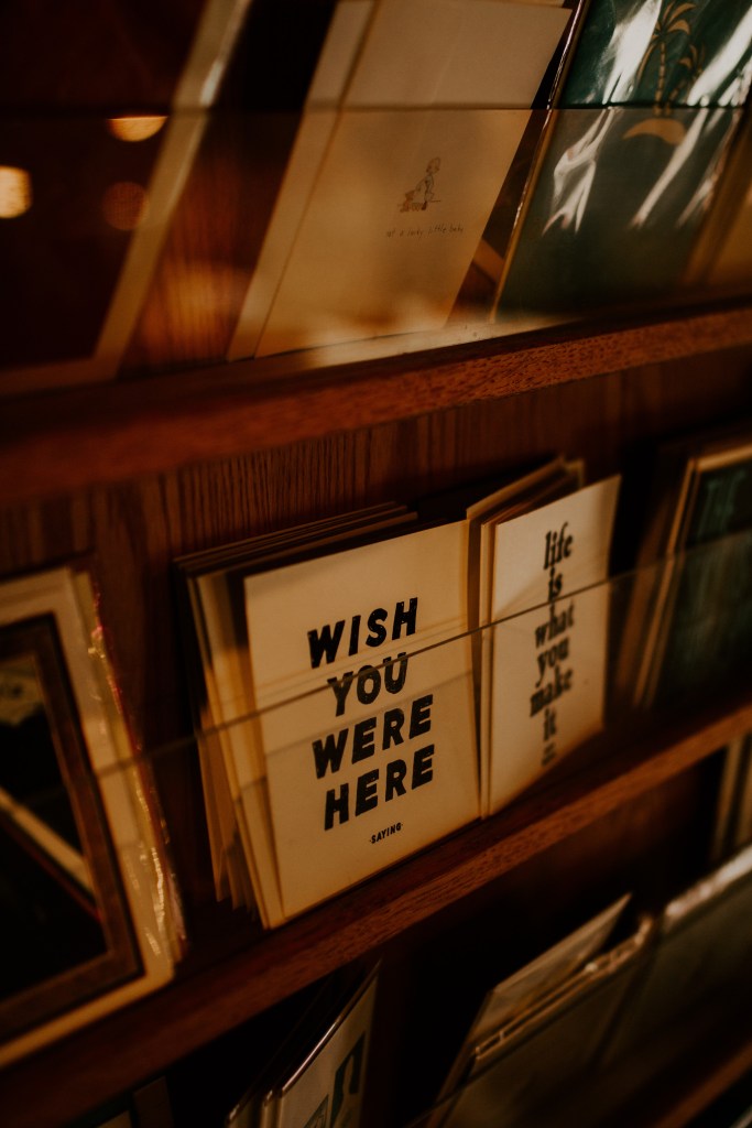 Cards for sale reading "Wish You Were Here"