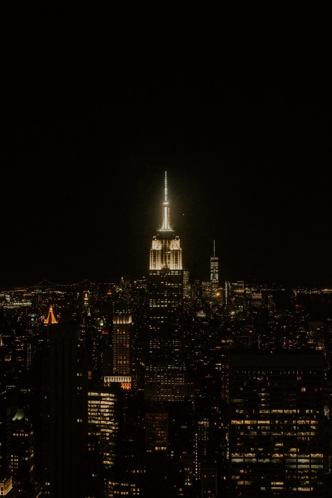 Empire state building aglow in the night sky
