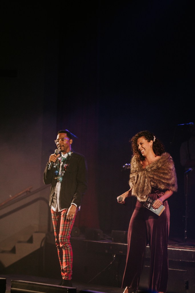 Damean Easter and Grace Wilkinson laughing on stage